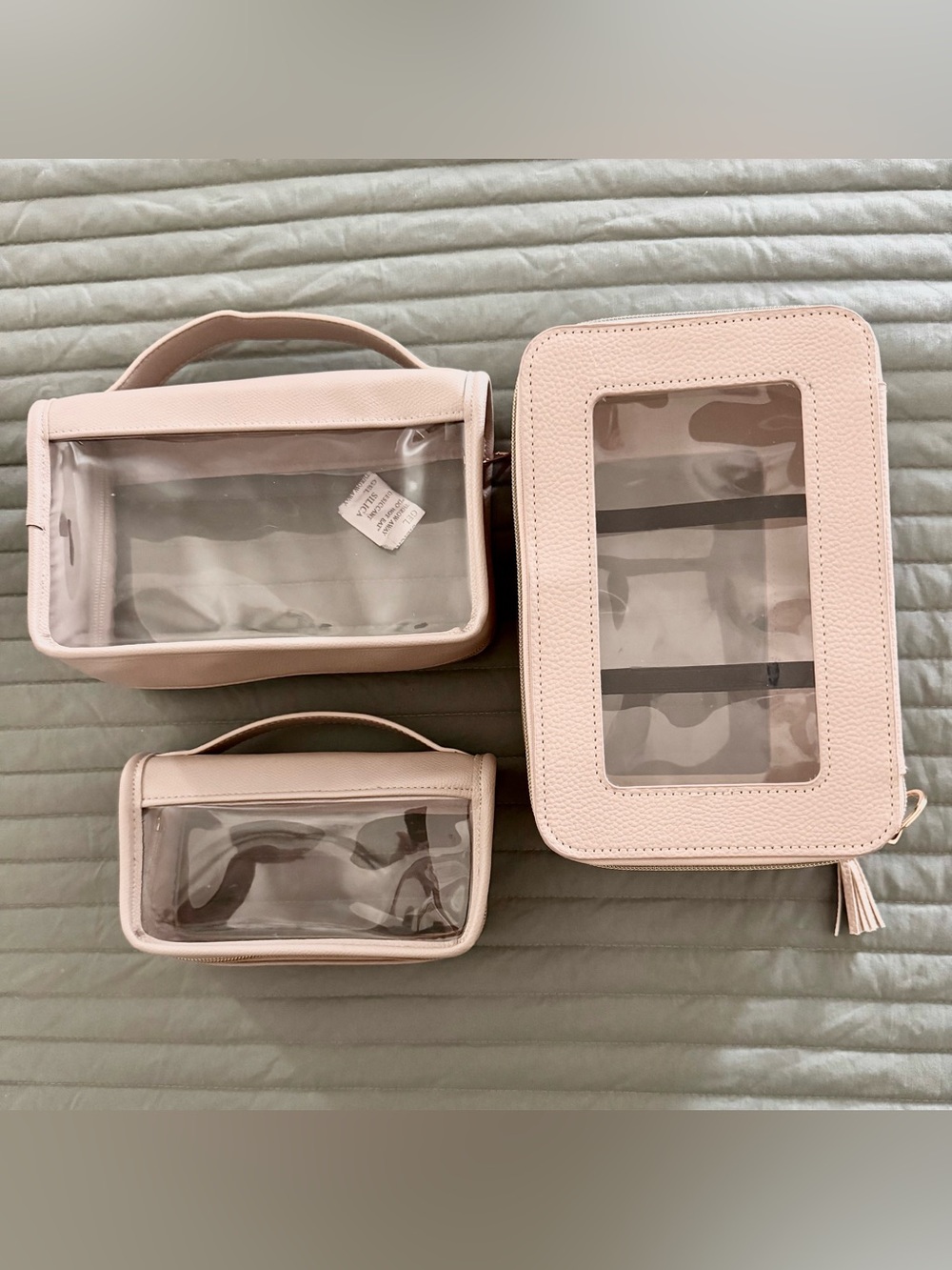 Set a three light greige travel toiletry makeup Dopp bags